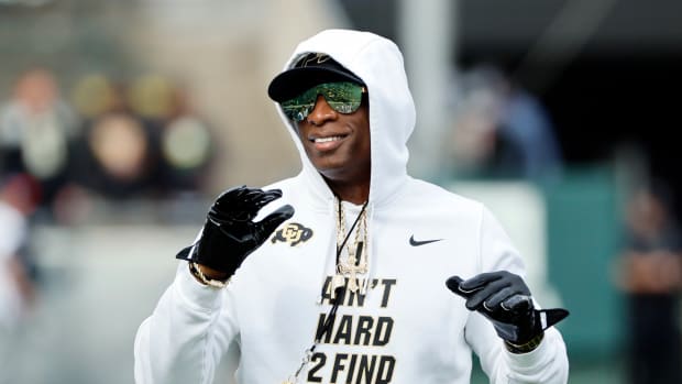 Colorado Buffaloes head coach Deion Sanders walks on the field before the game against the Oregon Ducks at Autzen Stadium